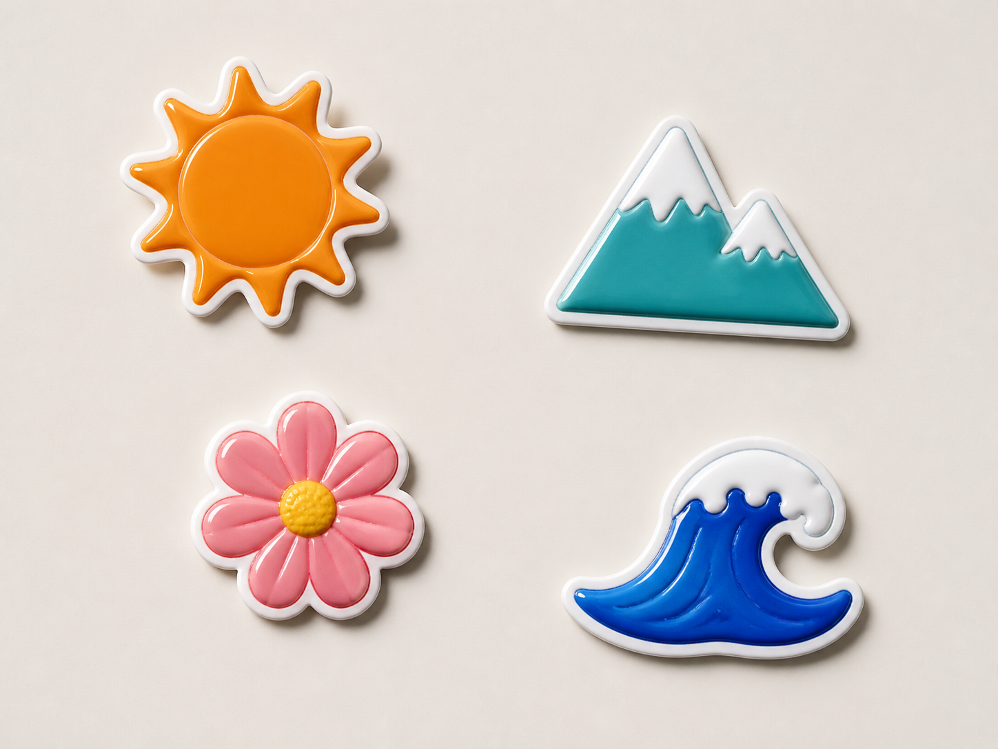 Four glossy sticker-like image elements on a solid background